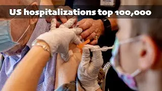 US hospitalizations top 100,000 for first time since January