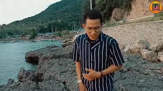 FEBRI BUTOLO ( SENYUM JO BIAR SAKI) Cover