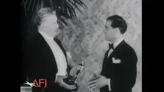 Bette Davis, Spencer Tracy, Deanna Durbin, Frank Capra and Walt Disney winning Oscars (1939)