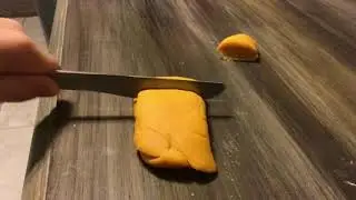 Simon cutting play-doh