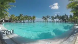 360 VR Scene of tropical resort with swimming pool and palms, Mauritius