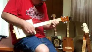 4 string cigar box Baritone Ukulele, Macanudo box, acoustic, curly maple fingerboard