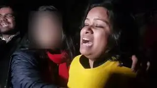 At JNU main gate female protester breaks down, Says she was 