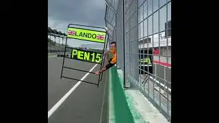 Daniel ricciardo holding norris' pitboard