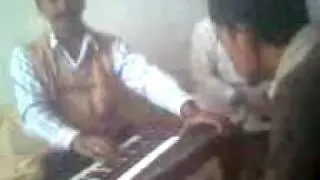 uistad ijaz tawakal grokh kalyan  teaching his son khyam.3gp