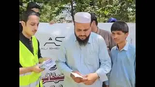 Flood Victims JDC Team Son of Pakistan Mr Ali Sheikhani distributes Rs 10,000 cash among the victims