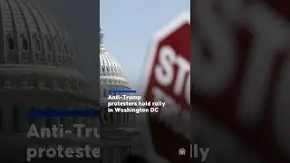 Anti-Trump protesters hold rally in Washington DC