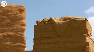 Giant sand sculptures depicting fairy tale characters on display in Denmark