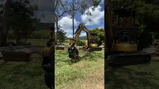 Heavy-Duty Hydraulic Rock Grab Masterfully Lifting Logs