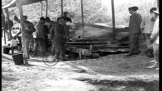 Italian troops set up a field kitchen on the Isonzo front during World War I HD Stock Footage