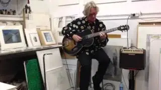 Ad Vermeer speelt improvisaties op slide-gitaar