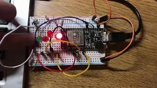 Pushbutton toggle (interrupt vs. polling)