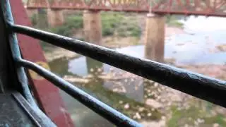 TKD WAG-7 powers 04012 NZM-SNSI SPL EXP cautiously passes from Narmada Bridge.
