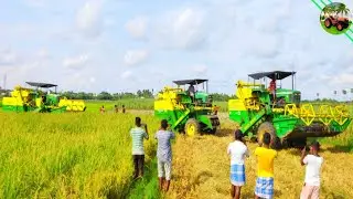 Awesome! Harvester machine stuck in mud rescued by two harvesters
