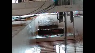 Dam break wave and air-water flow down a stepped cascade