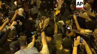 Brazil flag torched at demo, police use tear gas