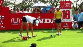 I K Kim & Michelle Wie (drop the S.H.I.T) tee off at 18'th hole