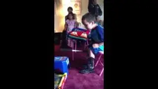 Joe Richards Jr. Singing at his head start graduation dinner. Young warrior.