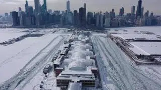 Polar vortex 2021:  Downtown Chicago covered in snow and ice amid historic cold snap -  Drone