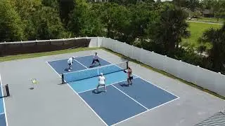 Drone Video in Melbourne, FL. Lance & Brandon vs Christy & Bonnie on backyard pickleball court