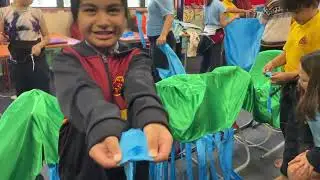 The story of Kuirau Park on a parade, with bunraku, rod puppets and string puppets.
