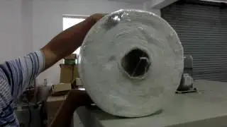 Sealing and shrinking machine for packing bobbin paper roll