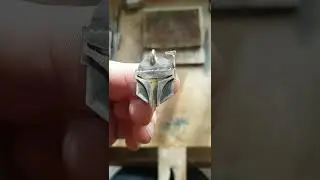 Silver Boba Fett helmet pendant yellow visor