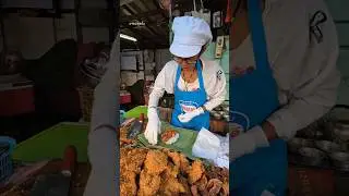 Sticky rice wrapped in banana leaves, 20 baht. A favorite among teenagers. Soi Witthayu Kanbin, B...