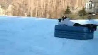 Drunken asshole goes down ski slope on an AEROBED