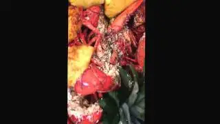 Lobster with grilled pineapples and jerk butter gravy sauce island spice grill