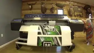 Bowfishing Extreme Rudder Wrap being printed on our Roland.