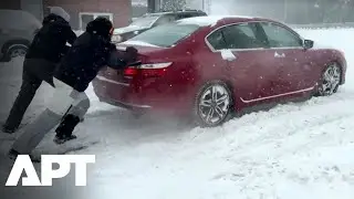 WATCH | NYC Buried as Residents Push Cars, Battle Ice in Brutal Snowstorm | APT