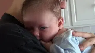 John snuggling with Daddy
