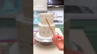 How-To stack a Two Tier Cake using a hammer and dowel Rod by Icing & Aprons