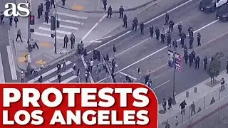 AERIALS of PROTESTERS CLASHING with POLICE outside FEDERAL building in LOS ANGELES