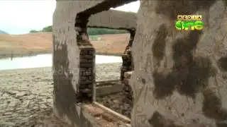 Colonial Bungalow rises water recedes in Thenmala Dam