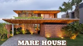 Mar&eacute; House | The House has an Open Space, with a Living Room Facing a Super Large Swimming Pool.