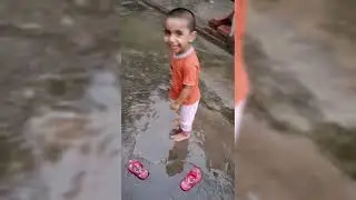 Gitashi playing on the roof after rain | Rainy Day Adventure | Splashing in Puddles on the Wet Roof