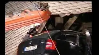 Germany: Car Crashes Through Church Roof