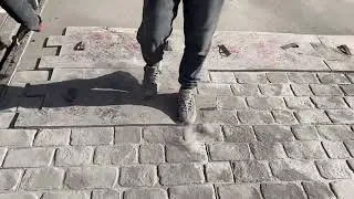 Imprinted concrete Kent process printing the pattern