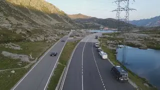 Gotthard pass Switzerland two beautiful  sportscars on the road