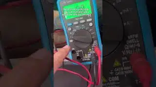 Power supply test using a multimeter and lamp.