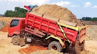 Mobil Truk DYNA JOMPLANG MUATAN TANAH MERAH FULL BAK MENGGUNUNG 