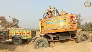 Samsung excavator machine heavy hard working soil filling/ Shahzad Net