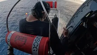 USCG Aircrew Recues Man From Vessel Fire