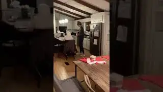 Guy runs and hits his head in top of the door frame.