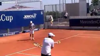 Eduardo Schwank hitting balls with Carlos Berloq at Mercedes Cup in Stuttgart