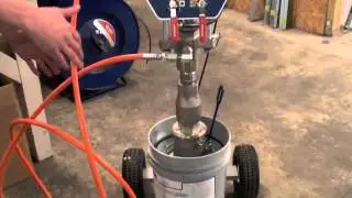 Dispensing Caulk or Adhesive from a Grapek Five Gallon Ram Dispense Package