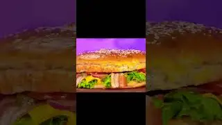Enorme hamb&uacute;rguer girando