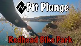 Technical rocks and scenic views. Pit Plunge at Redhead Bike Park in Chisholm, MN